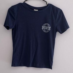 Pink navy blue tee shirt with pink logo on chest
